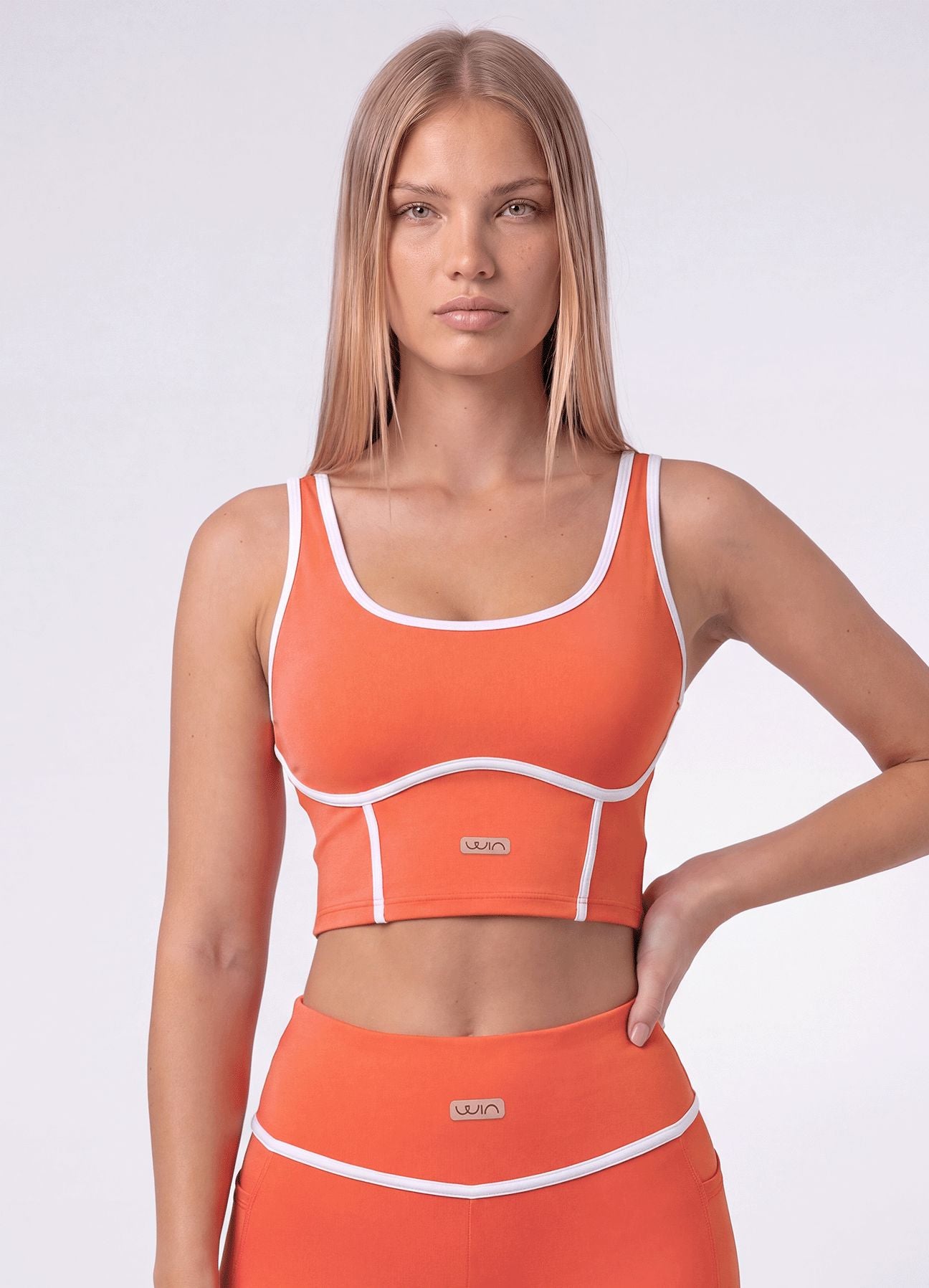 TOP EMANA WELLNESS - CORAL TOPS WIN ROPA DEPORTIVA