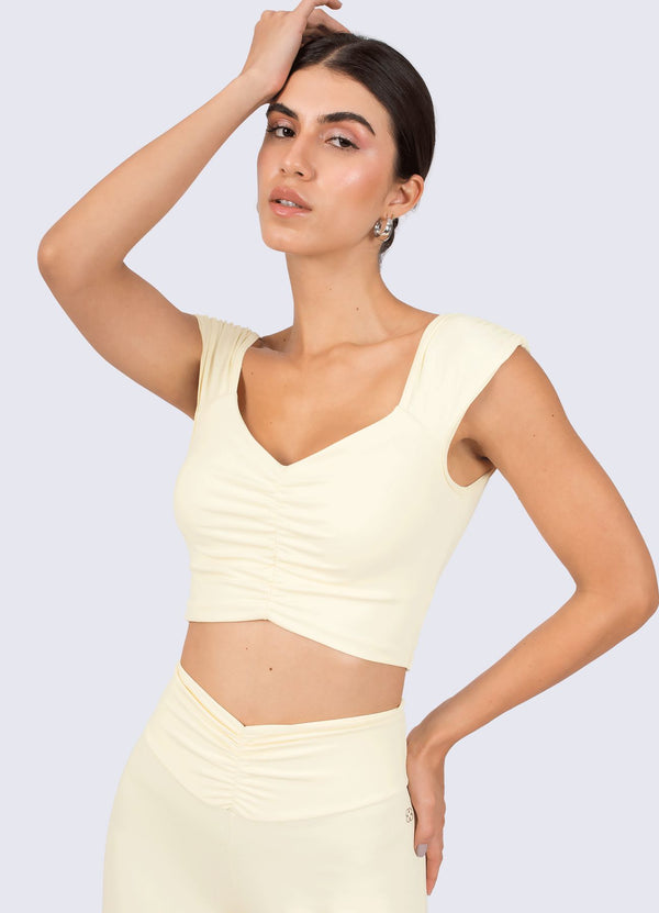CROP EMANA FLOW - BUTTERCREAM CROPS WINropadeportiva S Buttercream 