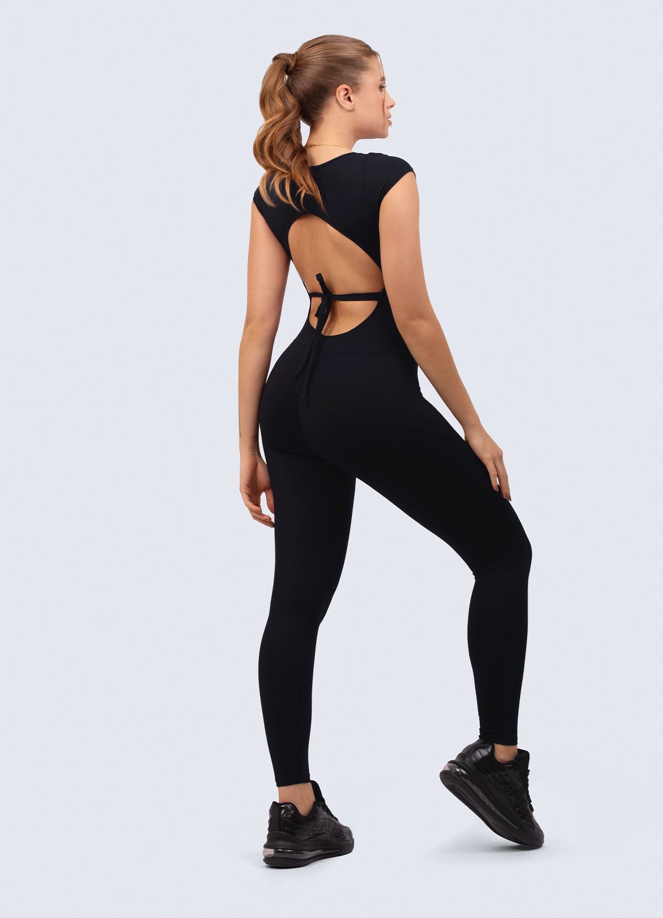 ENTERIZO EMANA BACK OFF-NEGRO TOPS WINropadeportiva 