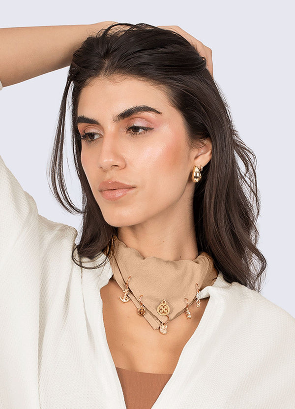 PAÑOLETA CALM - BEIGE ACCESORIOS WIN ROPA DEPORTIVA 